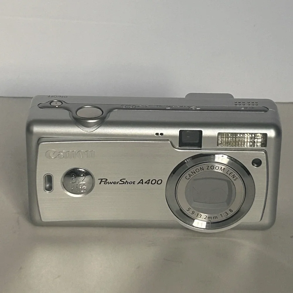 Canon PowerShot PC 1080 Digital Camera  Silver Tested  No USB w/Box ,Manual & SD